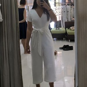 White jumpsuit with pockets